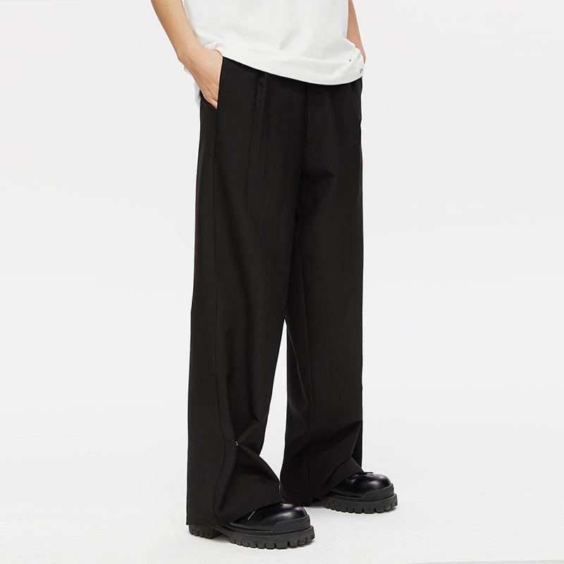 Trousers With Fold And Button Detail