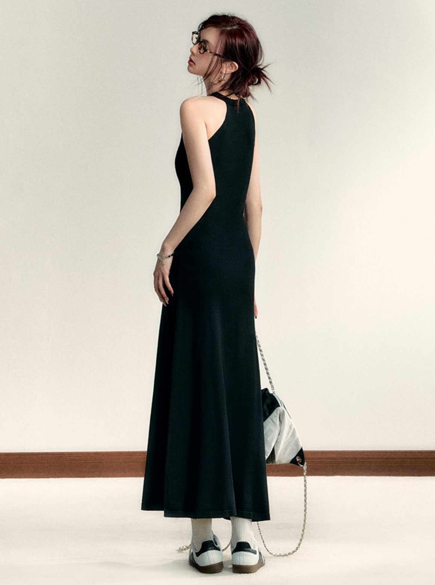 Sleek Halter Neck Maxi Dress: Fitted Black Evening Gown with Minimalist Logo Detail