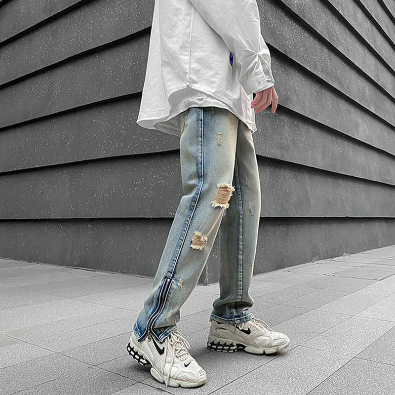 Faded Distressed Zip-Ankle Jeans